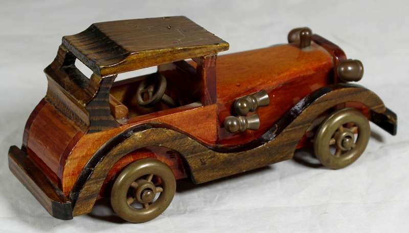 Carved wooden classical car