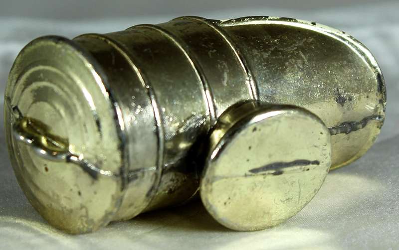 Miniature brass and porcelain shuttle