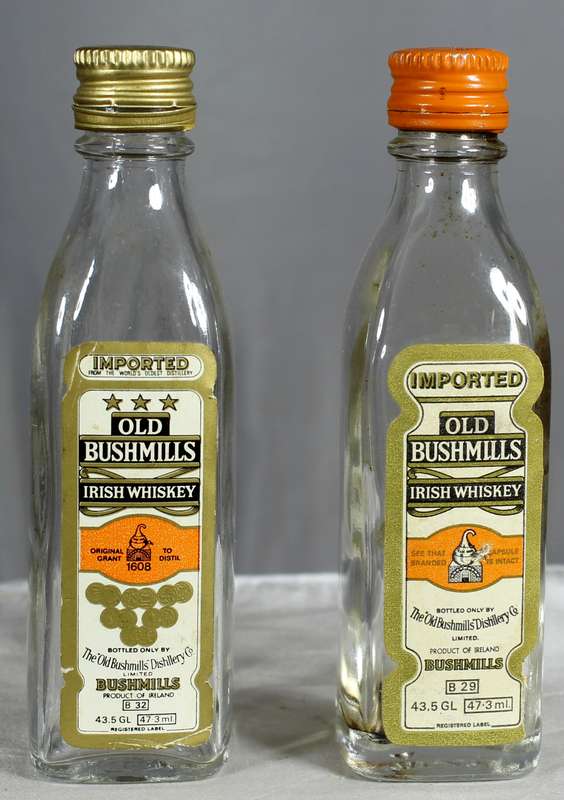 Empty liquor bottles - Pair of Old Bushmills whiskey