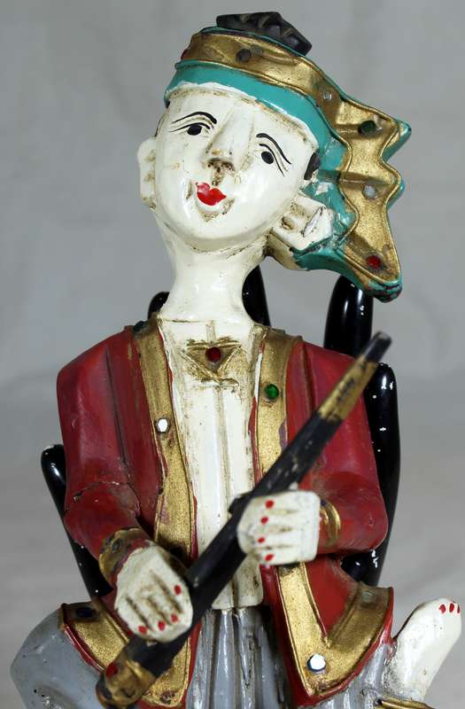 Burmese/Tibetan hand carved wooden musician