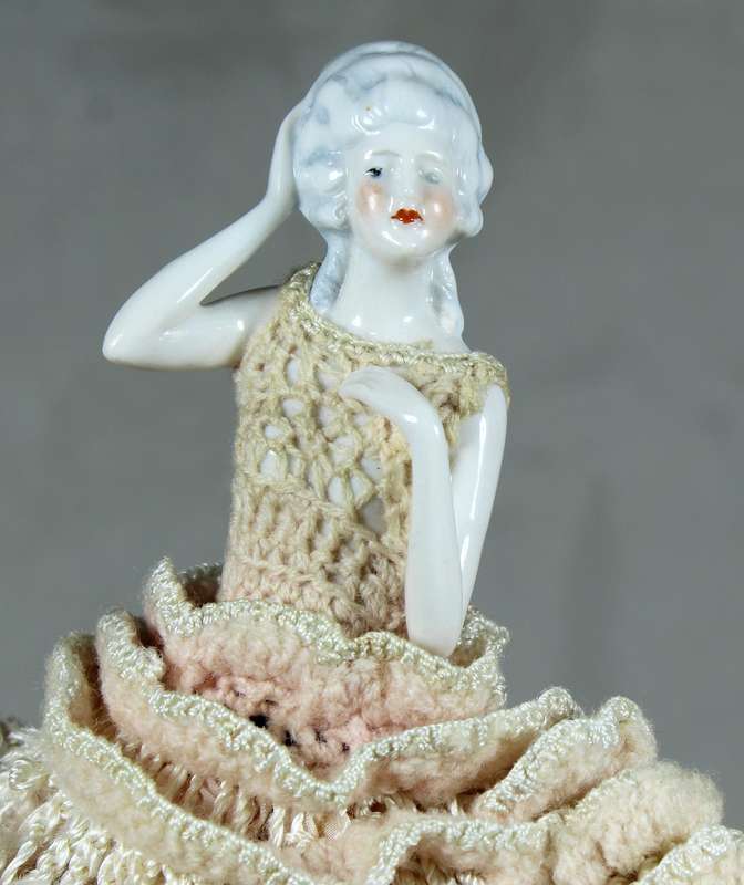 Half doll with pink dress