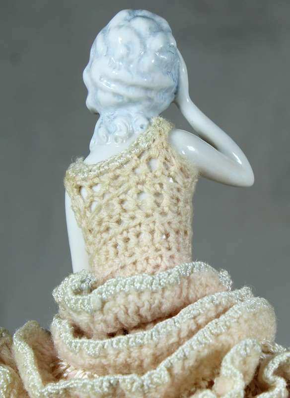 Half doll with pink dress