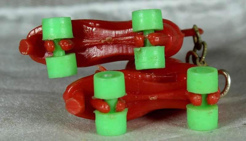 Miniature pair of plastic roller skates