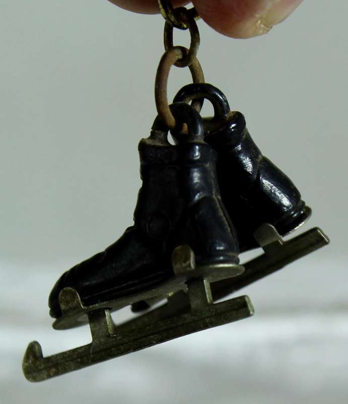 Miniature pair of ice skates
