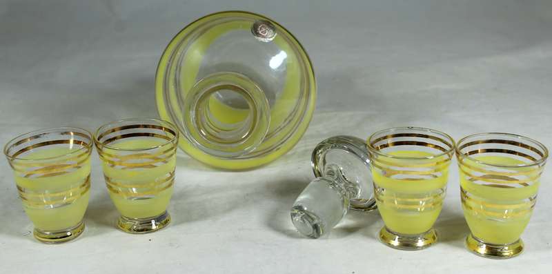 Decanter with yellow bars & four shot glasses