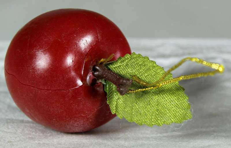 Miniature plastic apple