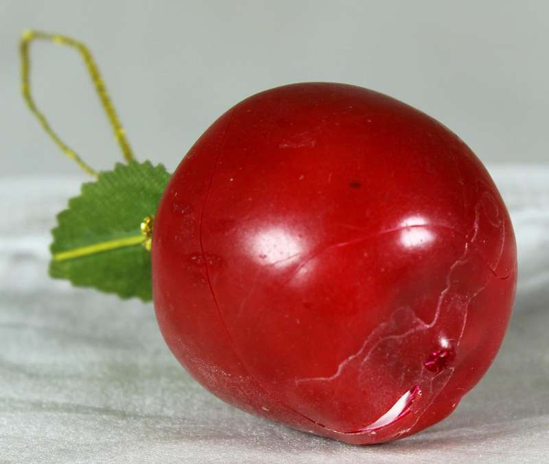 Miniature plastic apple