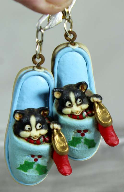 Pair of miniature cats in slippers