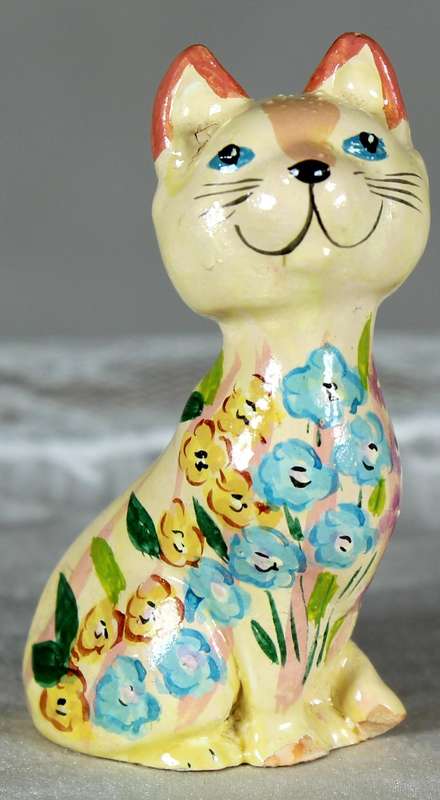 Miniature smiling cat