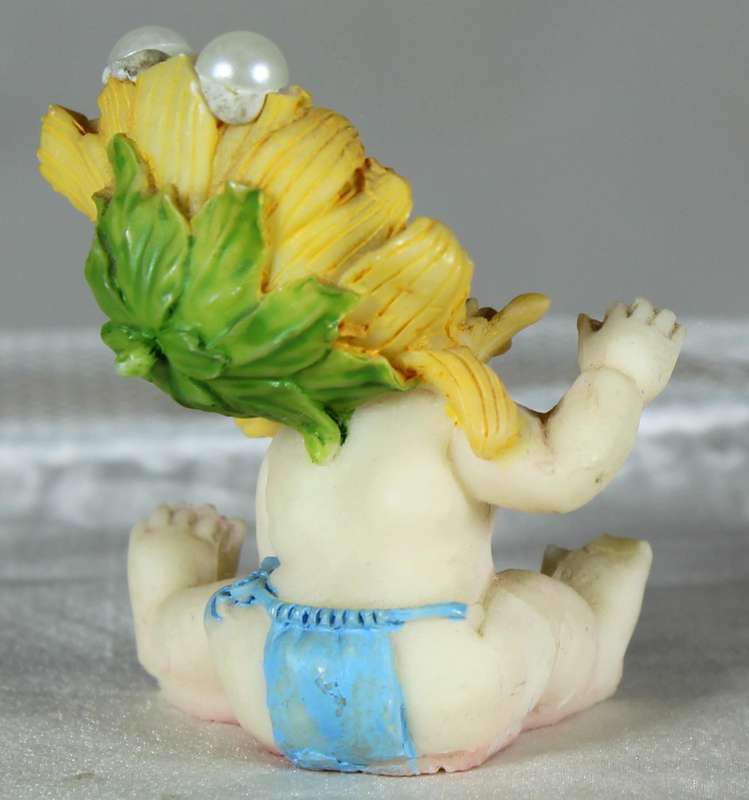 Miniature baby with sunflower cap