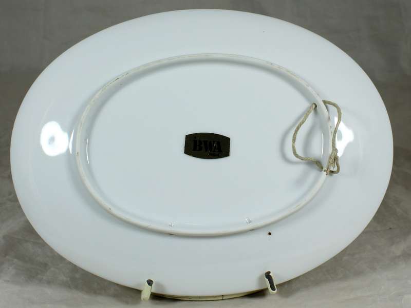 BWA display plate with purple and yellow flowers