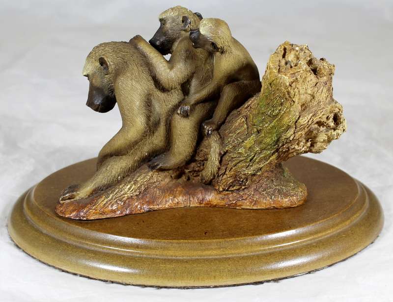 Molded baboons sculpture