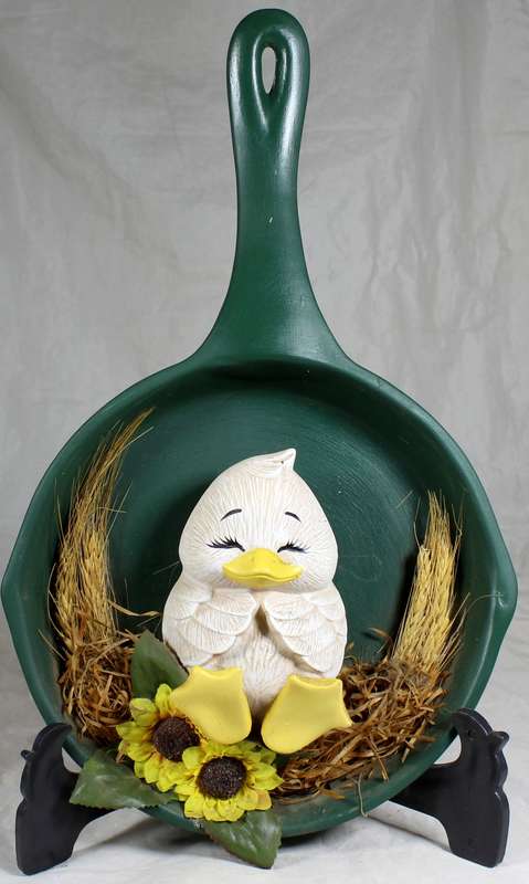 Chicklet in green frying pan