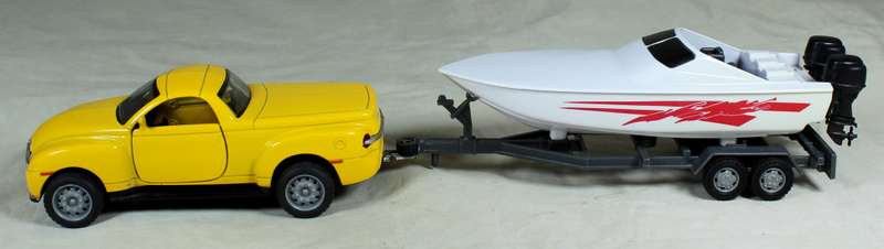 New Ray - 2003 Chevy SSR plus speed boat