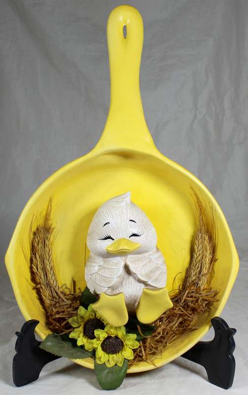 Chicklet in yellow frying pan