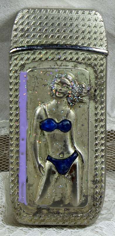 Vintage silver bikini lighter