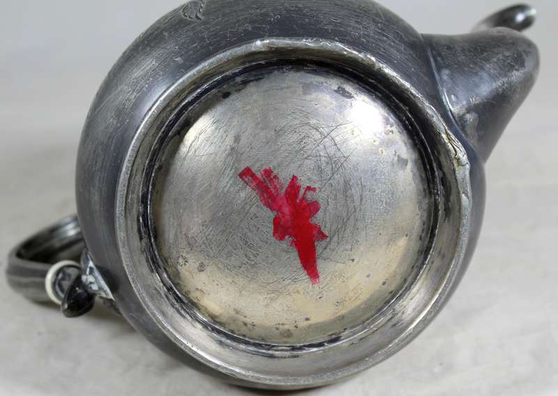 Silver plated tea kettle with extensive engravings