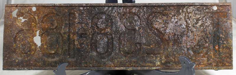 Vintage rusted TJ number plate