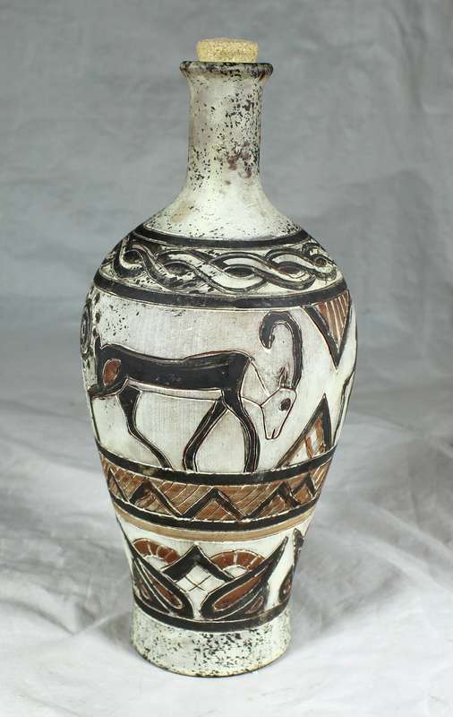 Hand painted pottery decanter