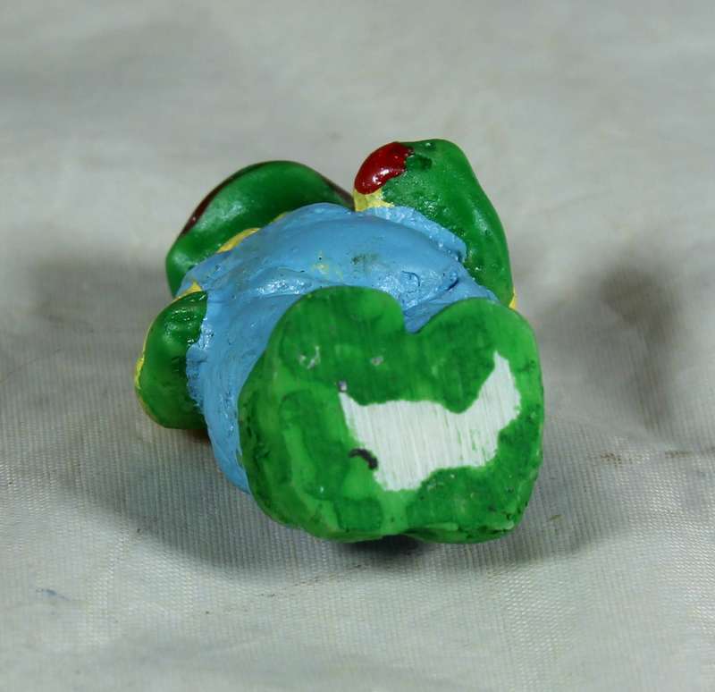 Miniature frog in dungaree's