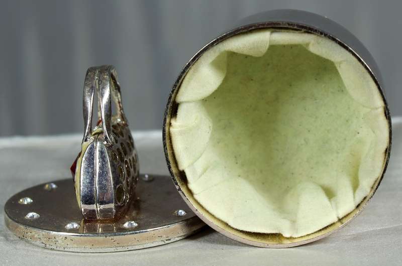 Small trinket holder with handbag on display