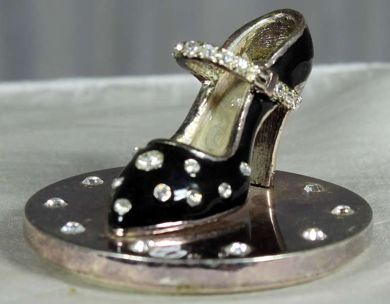Small shoe on display plate