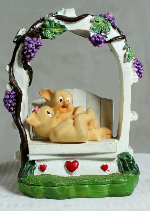 Piggies on Bench Under Grapevine A