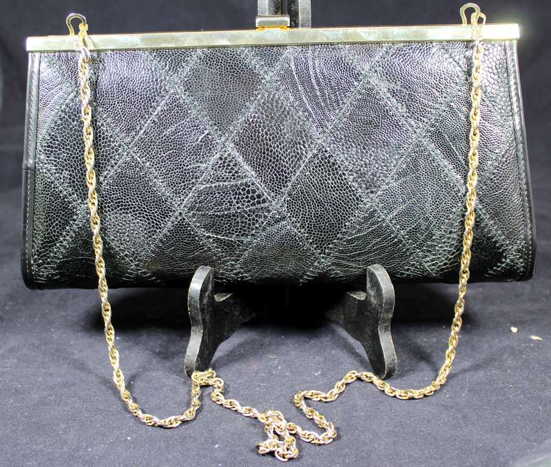 Corbeau Leather Clutch Bag