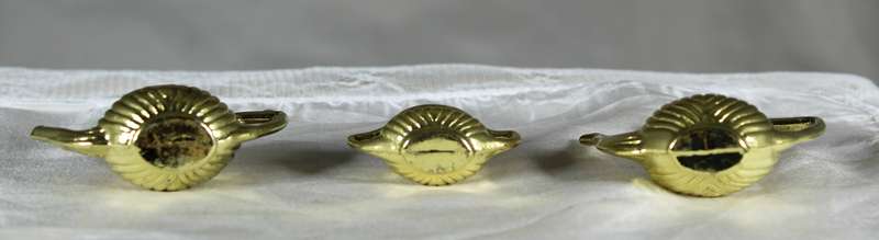 Trio of golden plated miniature pots