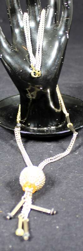 Costume jewelry - silver look necklace with ball pendant