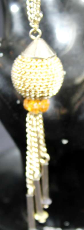 Costume jewelry - silver look necklace with ball pendant