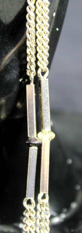 Costume jewelry - silver look necklace with ball pendant