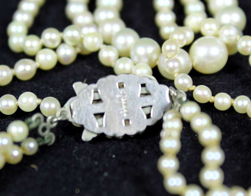 costume jewelry - pearl necklace with string silver clasp