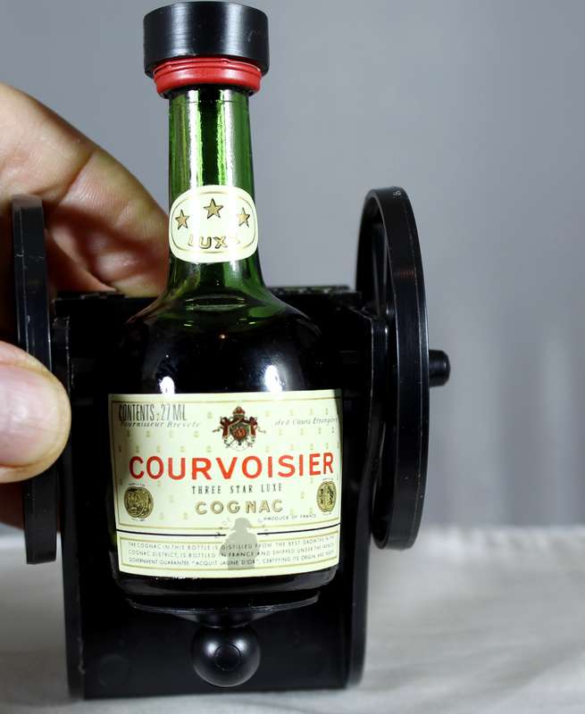 Mini liquor bottle - Courvoisier on canon