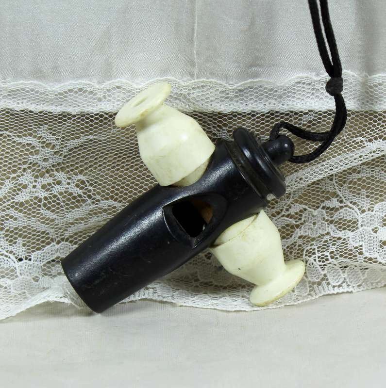 Plastic whistle in a canon shape