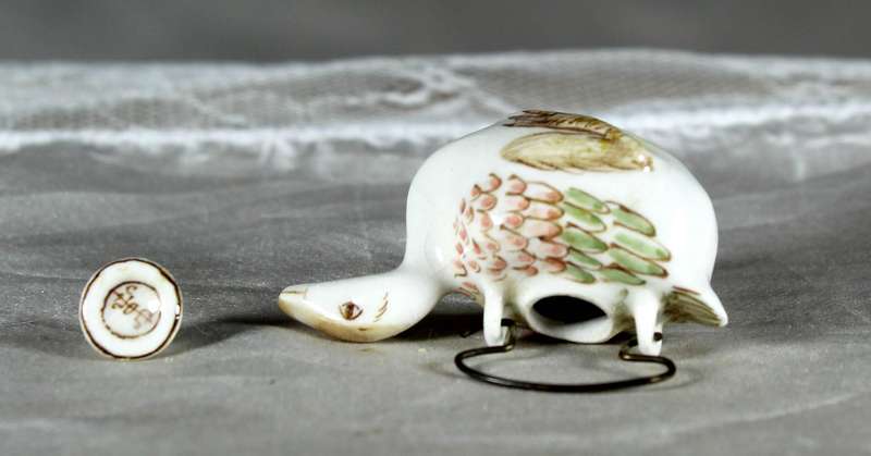 Miniature ornamental porcelain pot