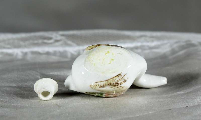 Miniature ornamental porcelain pot