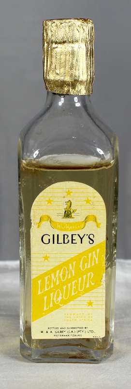 Mini liquor bottle - Gilbeys - Lemon gin liqueur