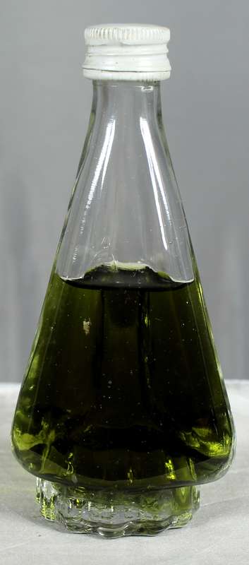 Mini liquor bottle - Triangular bottle with green liquid
