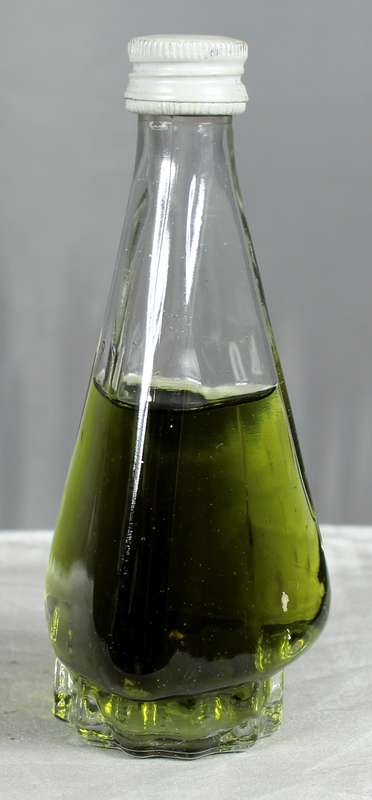 Mini liquor bottle - Triangular bottle with green liquid