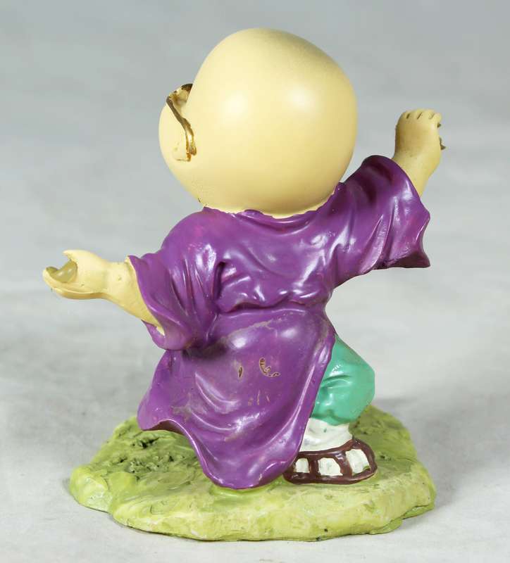 A baby Buddha - Monk laughing