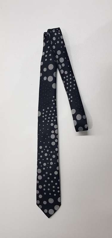 Mens Neckties: Description: Slimline necktie made by Fabio of Milano.