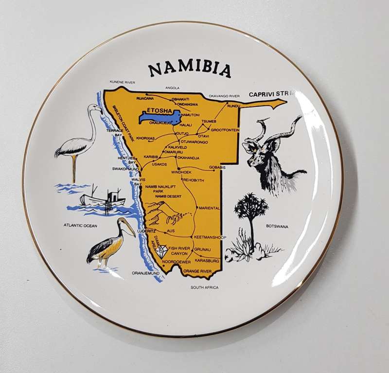 Vintage souvenir ceramic plate of Namibia by AB Ceramics. This colourful ceramic display plate