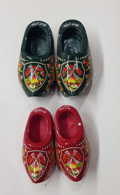 A set of graduated Handmade ornamental Dutch Wooden Clogs.