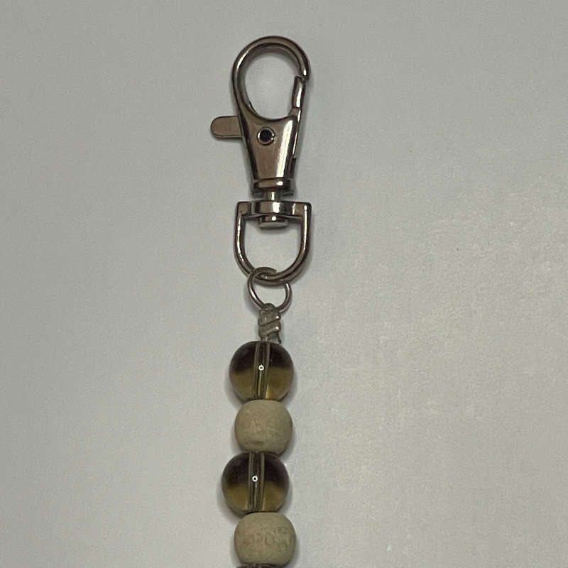 Creamy Wood and Smokey Bag Charm