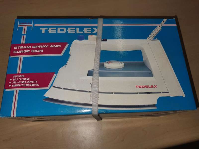 Antique Tedelex Iron still sealed in box.