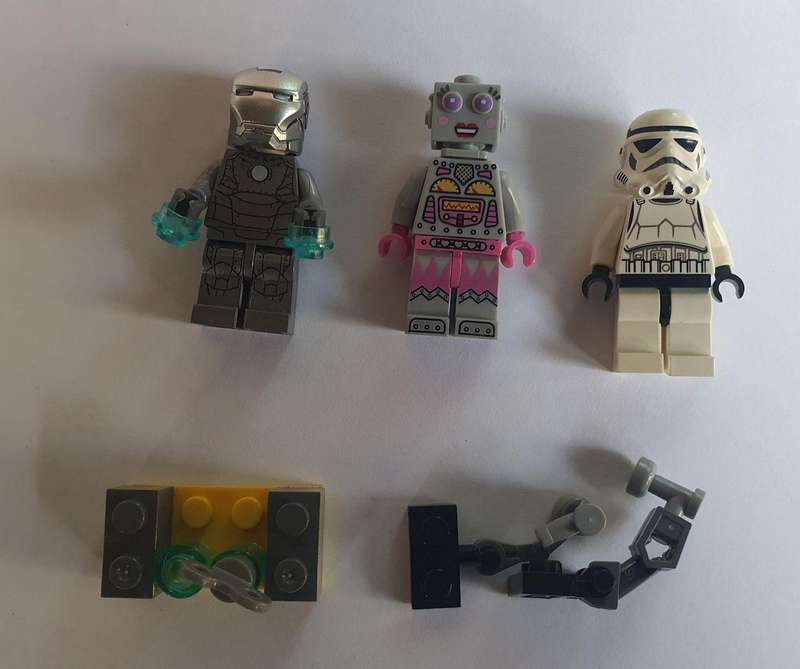 Lego Mini figurine 3 off with some Lego pieces