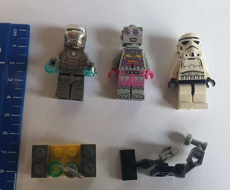 Lego Mini figurine 3 off with some Lego pieces