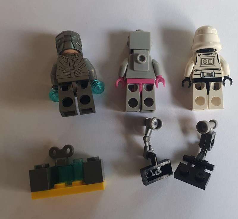 Lego Mini figurine 3 off with some Lego pieces