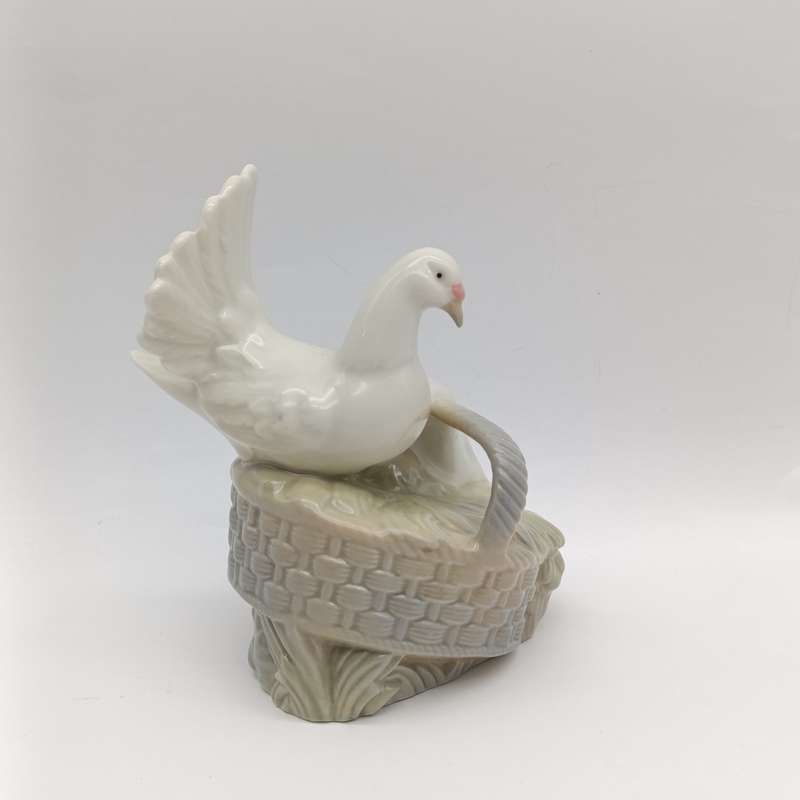 Vintage Porceval  Valencia dove in basket porcelain figurine